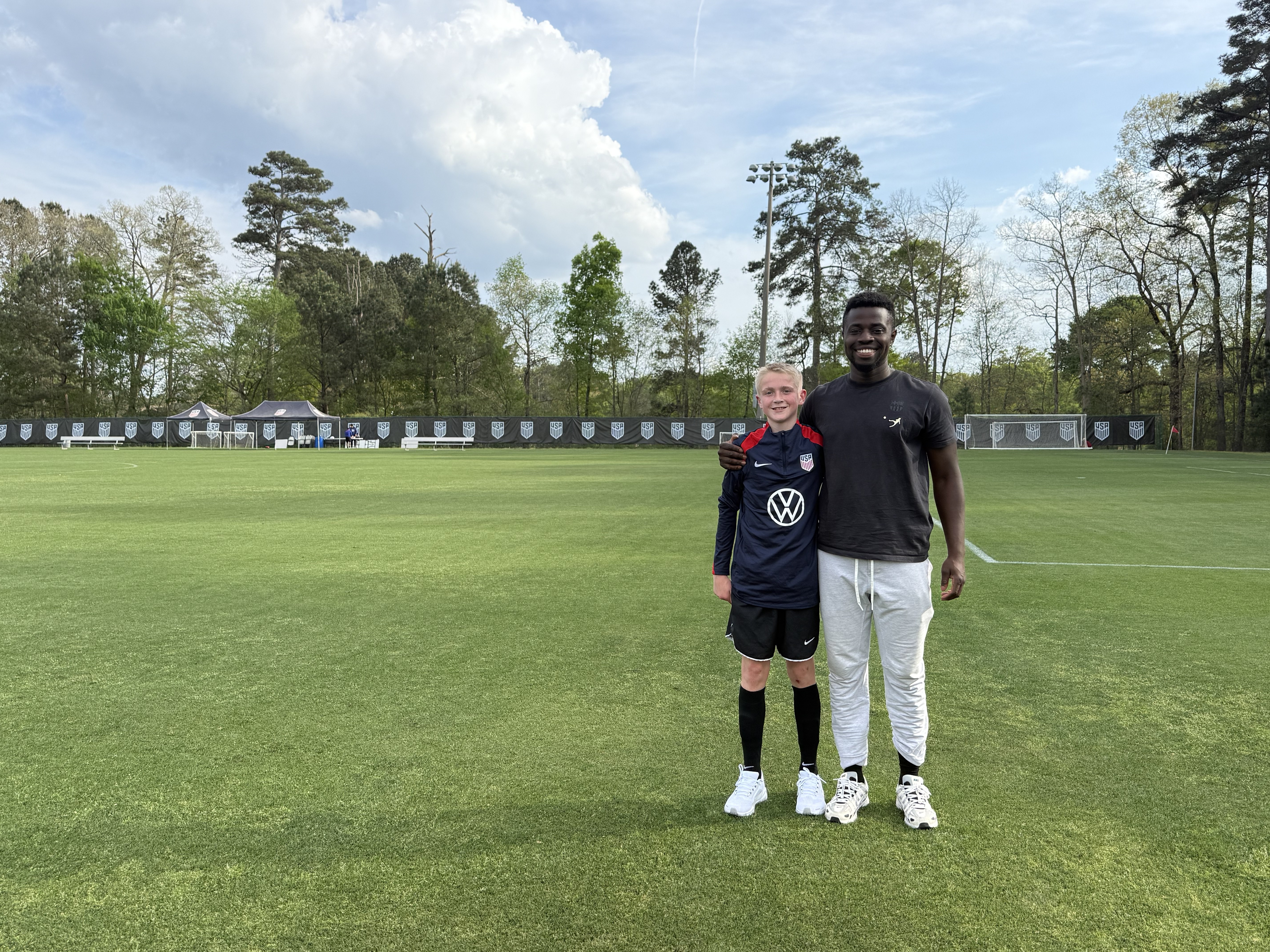 Coach Frim with player at USYNT mini camp